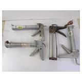 Four Caulk Guns