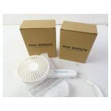 Lot of 2 Mini Breeze Rechargeable Hand Fans