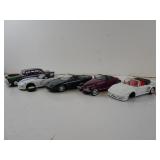 Five 1:24 Die Cast Cars