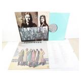 Lot of 2 Foreigner 33rpm Vinyl Records in Sleeves