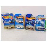 Lot of 4 Hot Wheels Die Cast Cars in Box