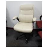 Tan Upholstered Rolling Office Chair