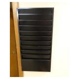 11 Pocket Wall File - Buyer to remove from wall
