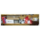 Grouping of HVAC Supplies on Bottom Shelf