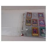 Binder full of Yu-Gi-Oh Cards