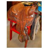 Tooled leather saddle