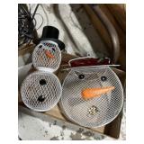 Pair of hanging snowman animal feeders