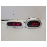2 mini alarm clocks battery operated or electric