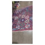 Multi colored hexagonal pattern quilt 82x69in