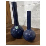2 blue ceramic gooseneck vases with a globular