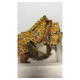 Buffalo statue, brass fruit bowl and table cloth