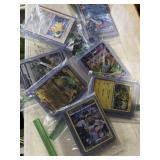 Pokï¿½mon cards in plastic sleeves multiple cards