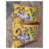 2 cheetohs Puffs cheese pizza flavor 8 oz bags