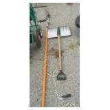 Snow shovel and tree saw