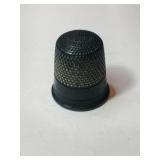 Silver thimble marked Sterling    .150oz