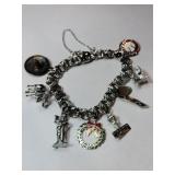 Sterling charm bracelet marked Sterling.
