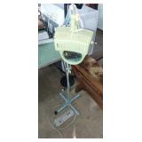 Articulating lighted magnifier stand and surge Articulating lighted magnifier stand and surge