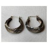 Silver hooped earrings marked 925.  .390oz Silver hooped earrings marked 925.  .390oz