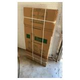 U-Haul boxes and 2 black trash cans with lids U-Haul boxes and 2 black trash cans with lids