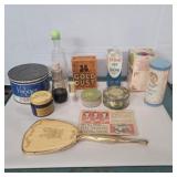 Advertising tins and beauty products and mirror Advertising tins and beauty products and mirror
