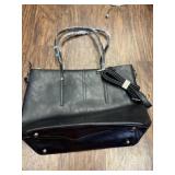 New purse still has tag and protective cover New purse still has tag and protective cover