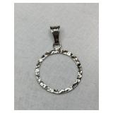 Silver round pendant Marked 925.       .040oz Silver round pendant Marked 925.       .040oz