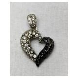 Silver heart-shaped pendant clear and red stones Silver heart-shaped pendant clear and red stones