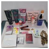 Assorted lotions, lip gloss, eyebrow kit and more Assorted lotions, lip gloss, eyebrow kit and more