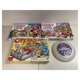 Lot of board games and frisbee Lot of board games and frisbee