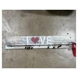 Wooden love sign with clips for family birthdays Wooden love sign with clips for family birthdays