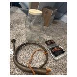 Glass pig jar and brass horn Glass pig jar and brass horn