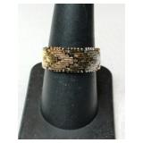 Gold tone silver ring marked 925 size 8.   .170oz Gold tone silver ring marked 925 size 8.   .170oz