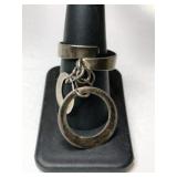 Silver dangle ring adjustable marked 925 size 8. Silver dangle ring adjustable marked 925 size 8.