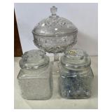 Two glass candy jars and pedestal candy dish with Two glass candy jars and pedestal candy dish with