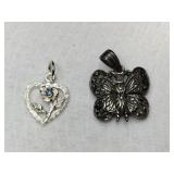 2 silver pendant heart and butterfly marked 925. 2 silver pendant heart and butterfly marked 925.