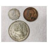 Mexico one peso, India British 1 Anna coin and a