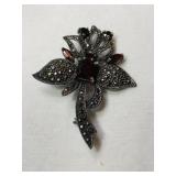 Silver brooch with red garnet stones marked 925
