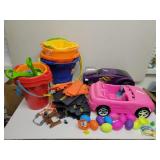 Race track, cars, sand buckets, footballs with