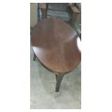 Wooden oval top coffee table 48x28x21in