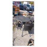 Cast aluminum outdoor patio table with 4 matching