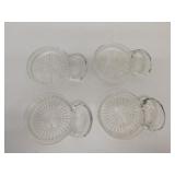 4 Vintage glass coasters or ashtrays