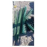 Plastic fencing and garden stakes