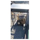 Wire basket with plastic wheels , desk and