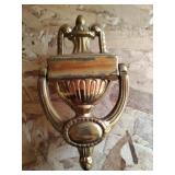 Brass door knocker.