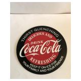 12 in round metal Coca-Cola sign