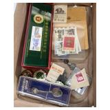 variety of postage stamps, pins, collector spoon,