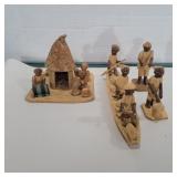 Hand carved thorn wood figures and scenes