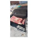 Wicker outdoor bench with cushion