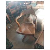 Round back wooden swivel chair