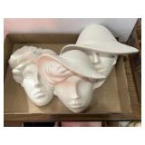 3 unfinished wall sculptures of faces